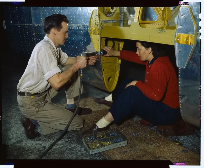 Framed Print : Woman and Man Working During World War II Framed Print : Woman and Man Working During World War II