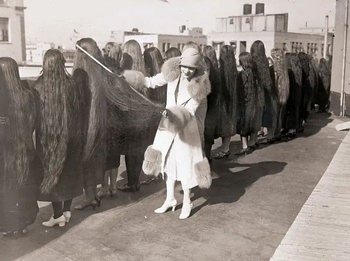 Framed Print : Woman Measuring Long Hair In Contest Framed Print : Woman Measuring Long Hair In Contest
