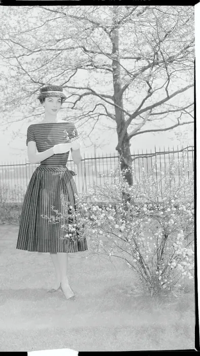 Framed Print : Woman Modeling an Afternoon Dress Framed Print : Woman Modeling an Afternoon Dress