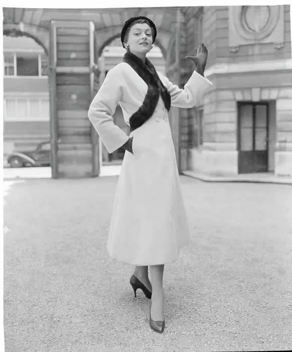 Framed Print : Woman Modeling a Coat Framed Print : Woman Modeling a Coat