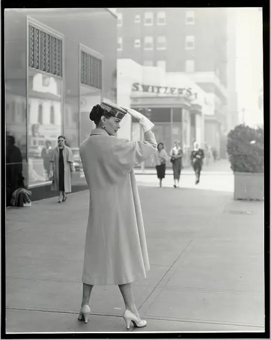 Framed Print : Woman Modeling Hand-Tailored Coat Framed Print : Woman Modeling Hand-Tailored Coat