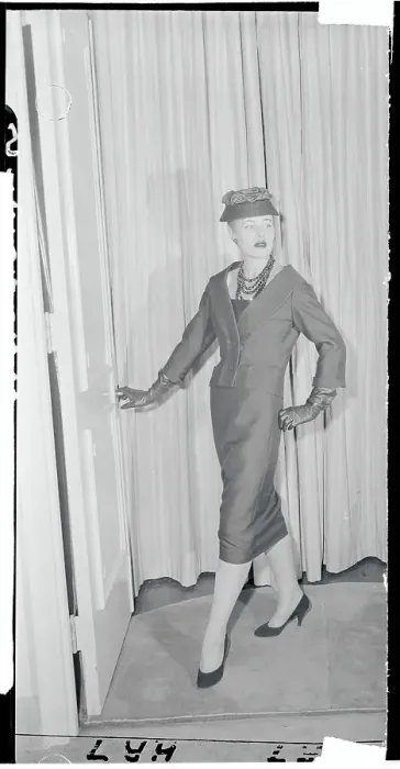 Framed Print : Woman Modeling a Suit Framed Print : Woman Modeling a Suit