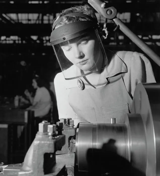 Framed Print : Woman Operating a Lathe Framed Print : Woman Operating a Lathe