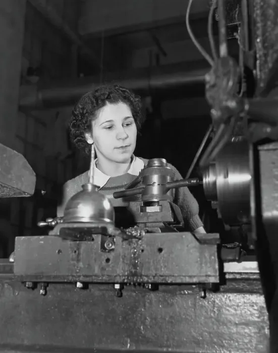 Framed Print : Woman Operating a Lathe Framed Print : Woman Operating a Lathe