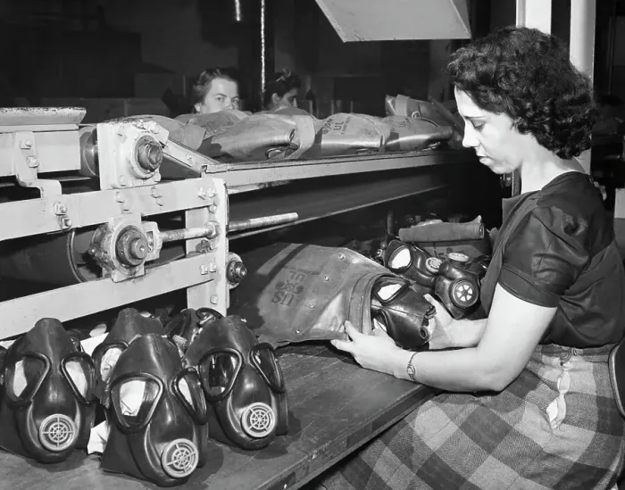 Framed Print : Woman Packing Assembled Rubber Gas Masks Framed Print : Woman Packing Assembled Rubber Gas Masks