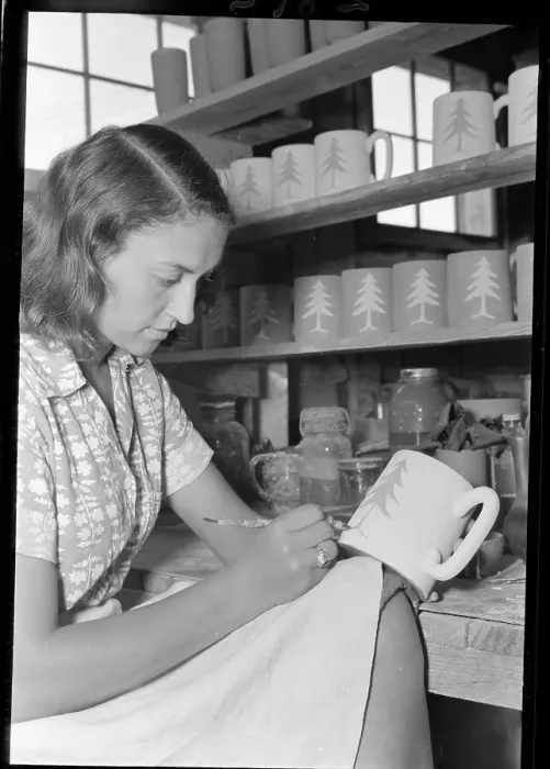 Framed Print : Woman Painting A Cup / Pottery Framed Print : Woman Painting A Cup / Pottery