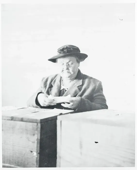 Framed Print : Woman Pausing at Ballot Box While Voting