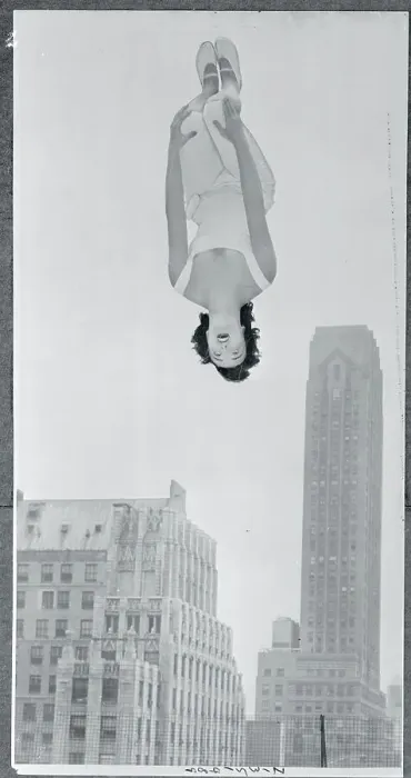 Framed Print : Woman Performing a Back Flip Framed Print : Woman Performing a Back Flip