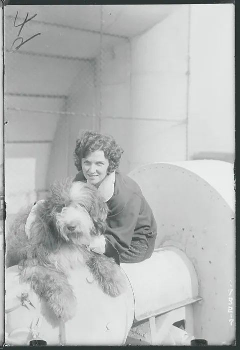 Framed Print : Woman with a Pet Dog Framed Print : Woman with a Pet Dog