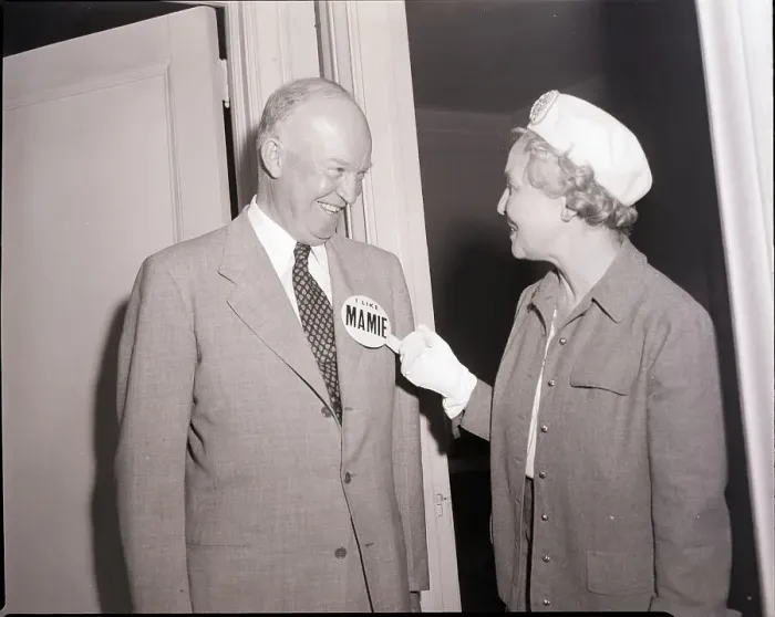 Framed Print : Woman Pins Button on Dwight Eisenhower Framed Print : Woman Pins Button on Dwight Eisenhower