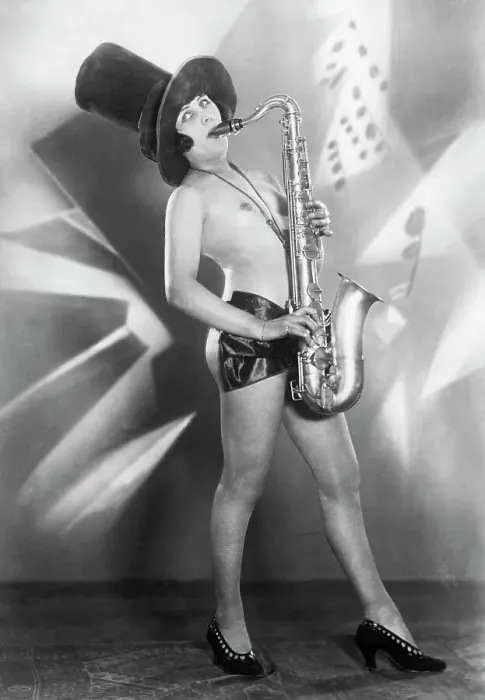 Framed Print : Woman Playing a Saxophone Framed Print : Woman Playing a Saxophone