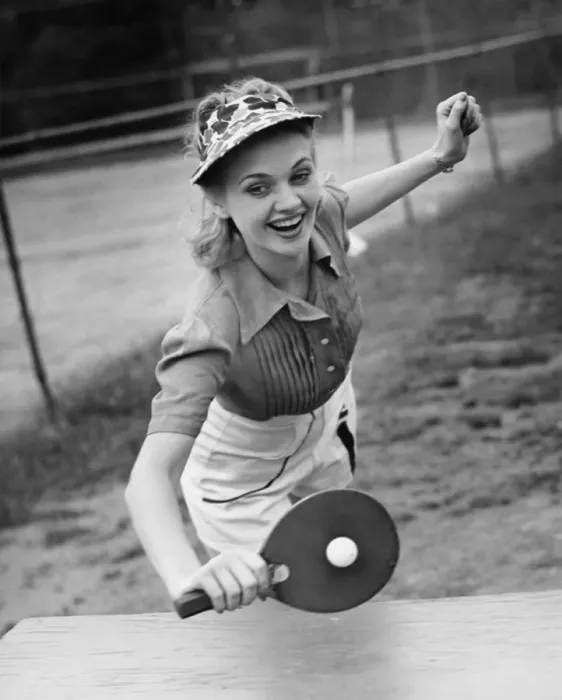 Framed Print : Woman playing table tennis, (B&W) Framed Print : Woman playing table tennis, (B&W)
