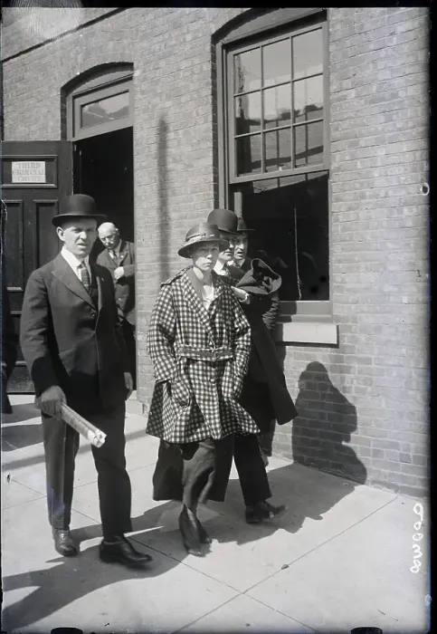 Framed Print : Woman in Police Custody Framed Print : Woman in Police Custody