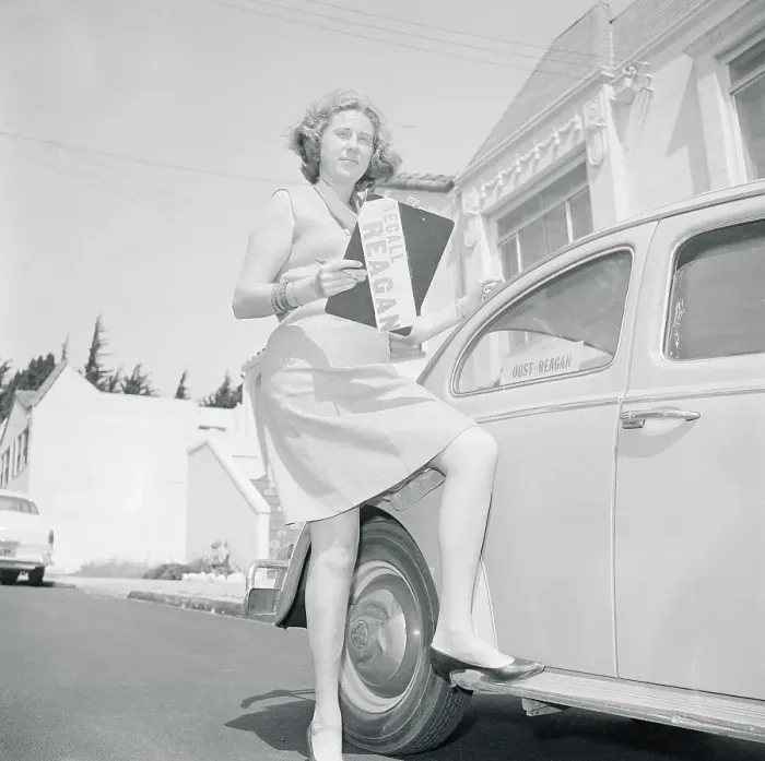 Framed Print : Woman Posing Next to a Car Framed Print : Woman Posing Next to a Car