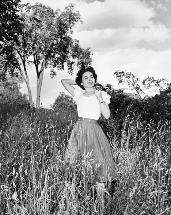 Framed Print : Woman posing on meadow, (B&W), portrait Framed Print : Woman posing on meadow, (B&W), portrait