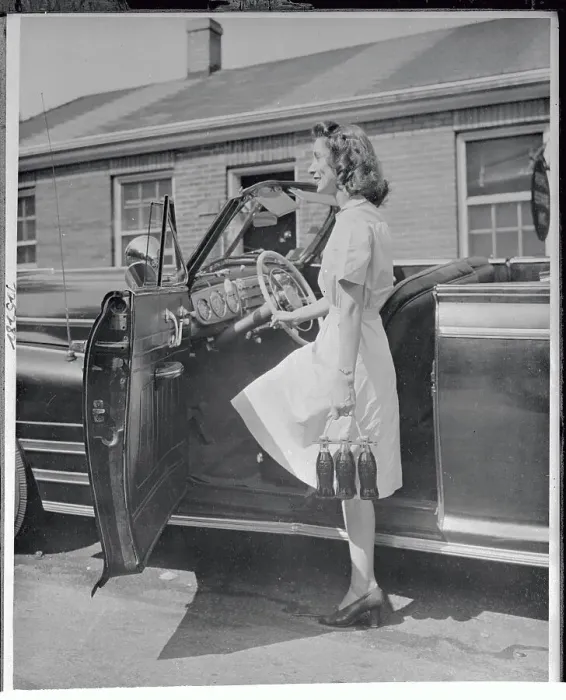 Framed Print : Woman Posing with New Bottle Carrier by Her Car Framed Print : Woman Posing with New Bottle Carrier by Her Car