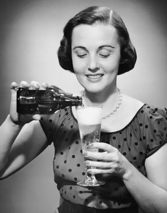 Framed Print : Woman pouring alcoholic beverage Framed Print : Woman pouring alcoholic beverage