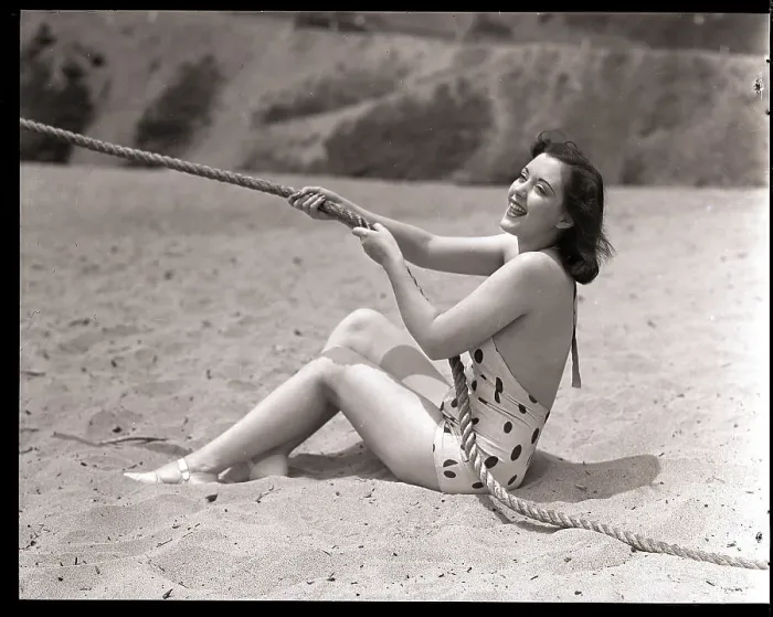 Framed Print : Woman Pulling on a Rope Framed Print : Woman Pulling on a Rope