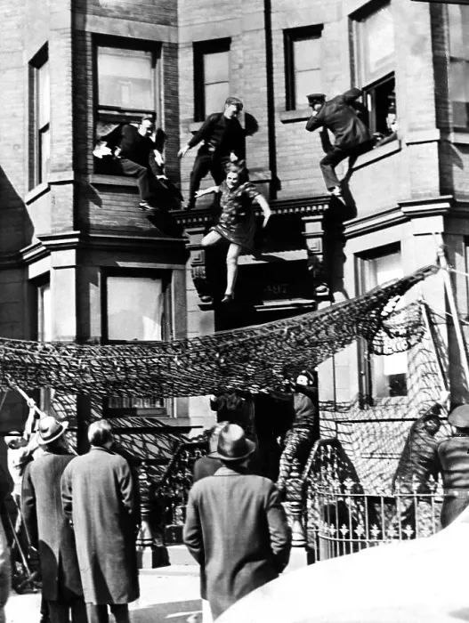 Framed Print : Woman Pushed Off Ledge Onto Police Net Framed Print : Woman Pushed Off Ledge Onto Police Net