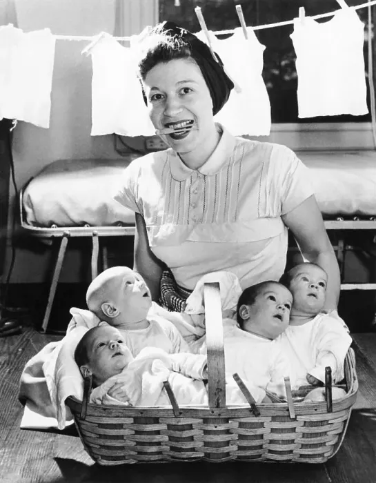 Framed Print : Woman with Quadruplets Framed Print : Woman with Quadruplets