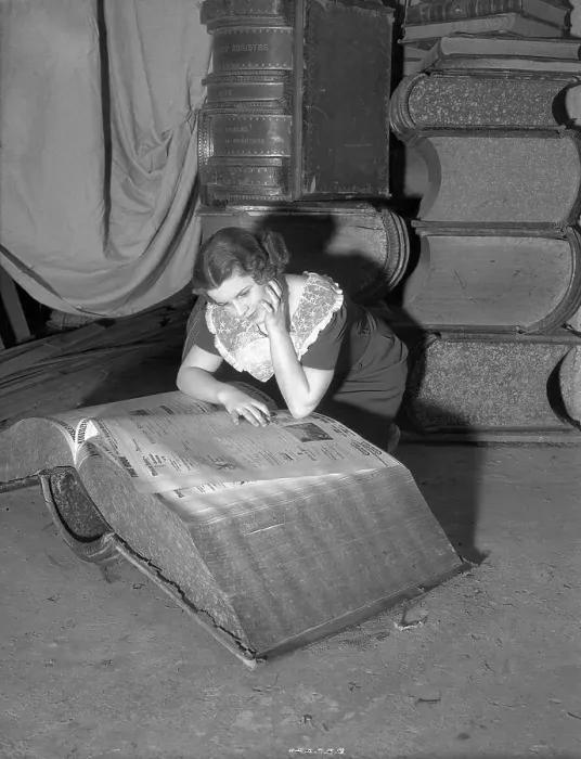 Framed Print : Woman Reading Giant Book Framed Print : Woman Reading Giant Book