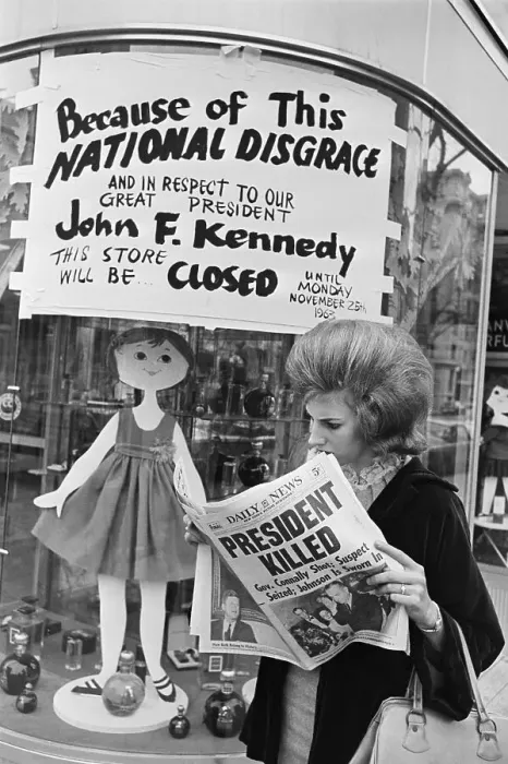 Framed Print : Woman Reading About President Kennedy's Assassination Framed Print : Woman Reading About President Kennedy's Assassination