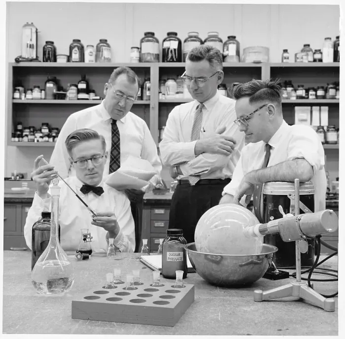 Framed Print : Woman Reading in Scientific Laboratory Framed Print : Woman Reading in Scientific Laboratory