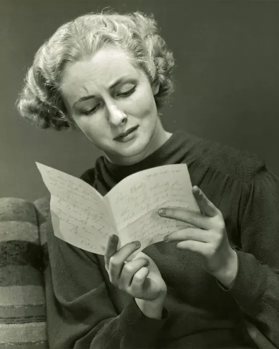 Framed Print : Woman reads distressing letter Framed Print : Woman reads distressing letter