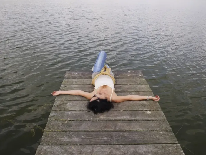 Framed Print : Woman relaxing lying on a wooden pier at a lake, Mecklenburg Lake District, Mecklenburg-Western Pomerania, Germany, Europe Framed Print : Woman relaxing lying on a wooden pier at a lake, Mecklenburg Lake District, Mecklenburg-Western Pomerania, Germany, Europe