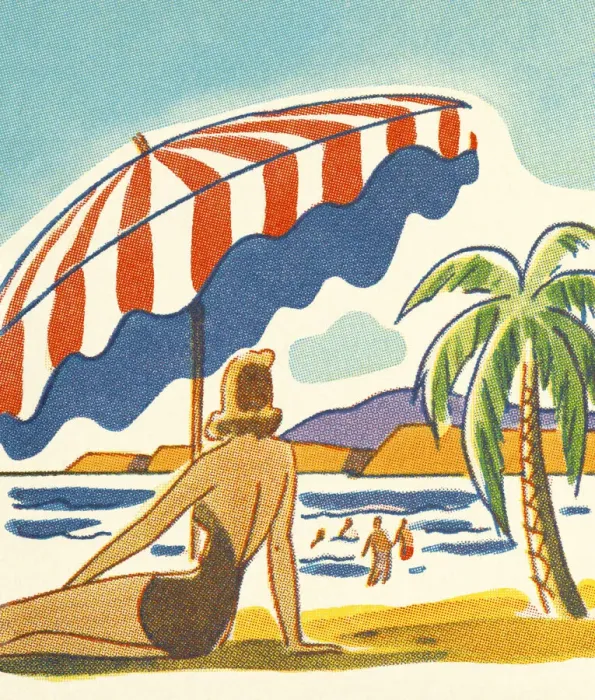 Framed Print : Woman Relaxing Under an Umbrella on the Beach Framed Print : Woman Relaxing Under an Umbrella on the Beach