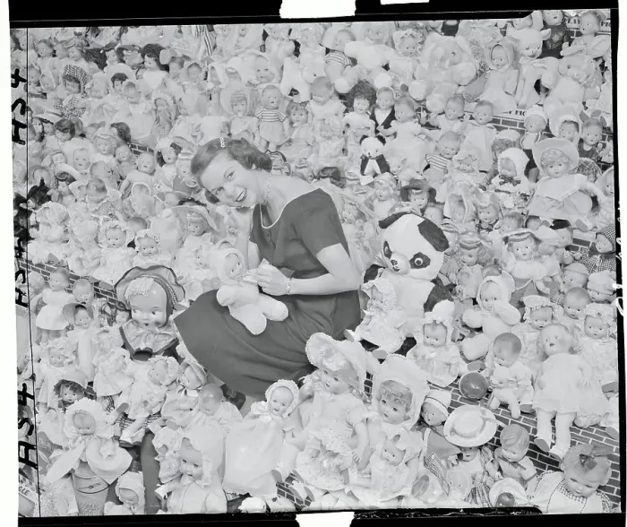 Framed Print : Woman in a Room of Dolls Framed Print : Woman in a Room of Dolls
