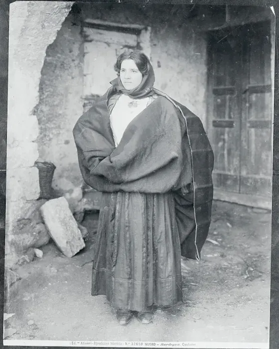 Framed Print : Woman in Sardenian Costume and Carrying Backpack Framed Print : Woman in Sardenian Costume and Carrying Backpack