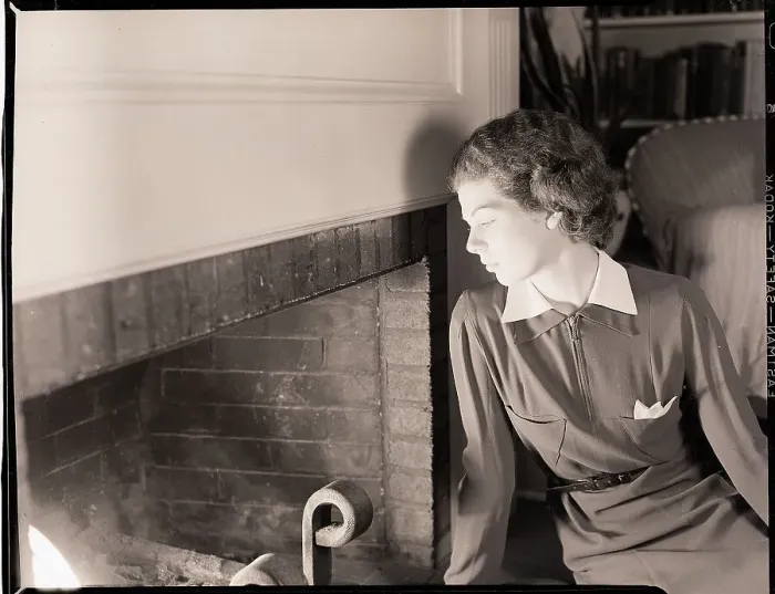 Framed Print : Woman Seated by Fireplace Framed Print : Woman Seated by Fireplace