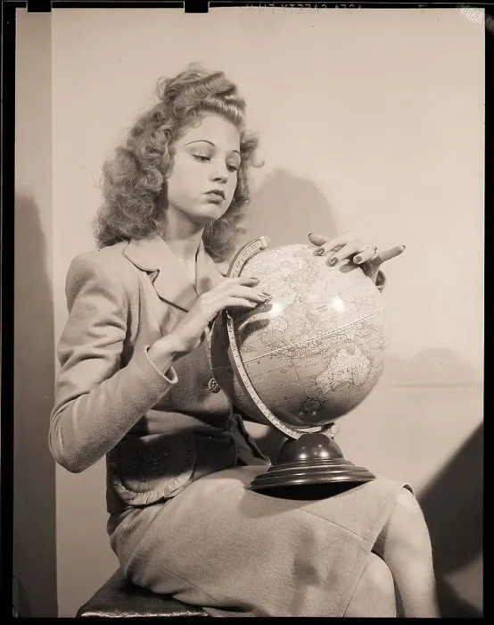 Framed Print : Woman Seated with Globe Framed Print : Woman Seated with Globe