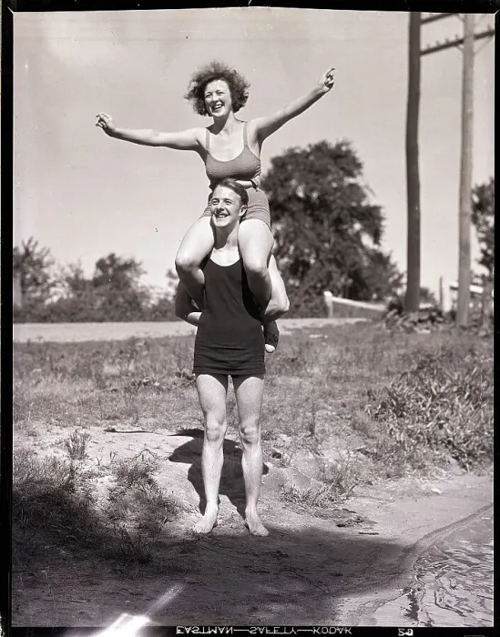 Framed Print : Woman Seated on Man's Shoulders Framed Print : Woman Seated on Man's Shoulders
