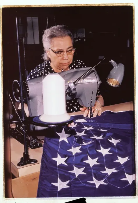 Framed Print : Woman Sewing Stars on a American Flag