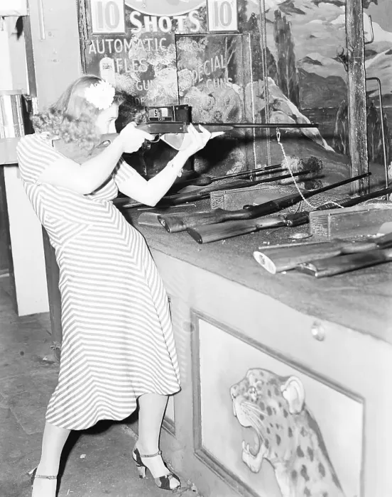 Framed Print : Woman at Shooting Gallery Framed Print : Woman at Shooting Gallery