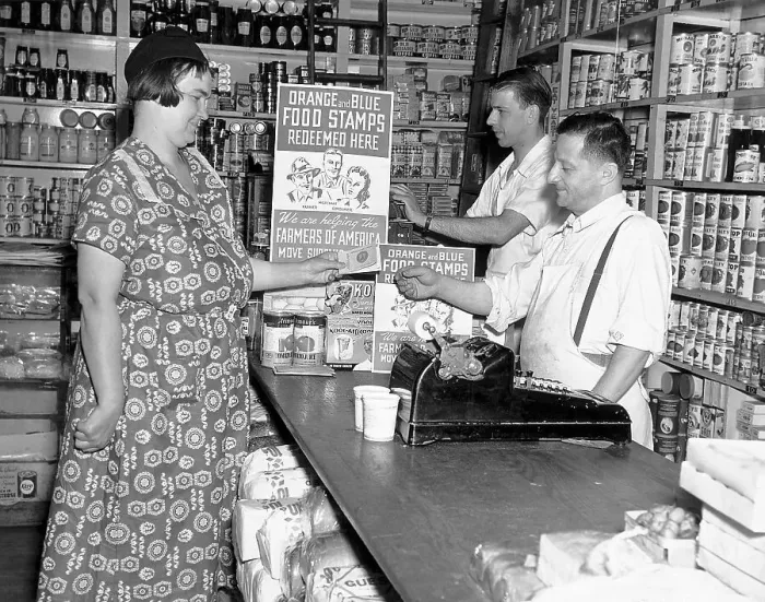 Framed Print : Woman Shopping with Her Ration Stamps Framed Print : Woman Shopping with Her Ration Stamps