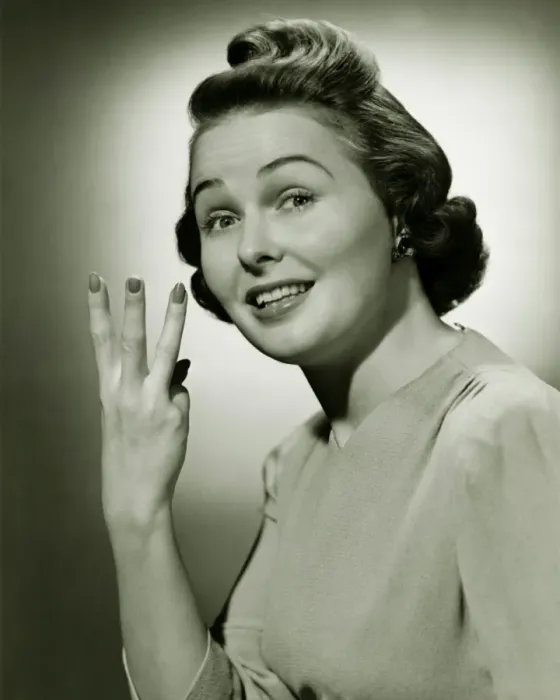 Framed Print : Woman showing three fingers in studio, (B&W), portrait