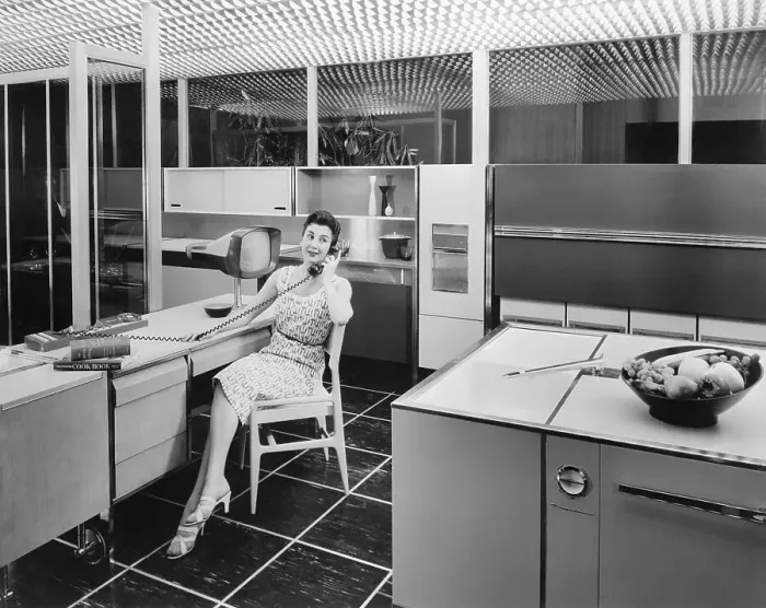 Framed Print : Woman Sitting in Kitchen Framed Print : Woman Sitting in Kitchen