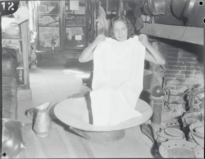 Framed Print : Woman Sitting in Old Bath Tub Framed Print : Woman Sitting in Old Bath Tub