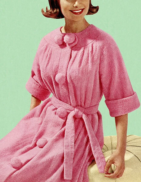Woman Sitting in Pink Robe