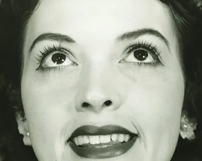 Framed Print : Woman smiling, Close-up of face, (B&W) Framed Print : Woman smiling, Close-up of face, (B&W)