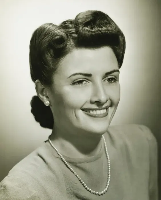 Framed Print : Woman smiling in studio, (B&W), close-up Framed Print : Woman smiling in studio, (B&W), close-up