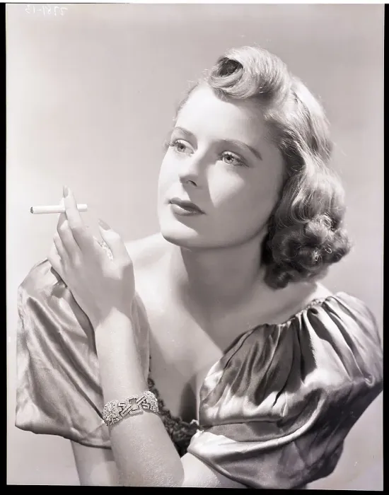 Framed Print : Woman Smokes While Modeling Negligee Framed Print : Woman Smokes While Modeling Negligee