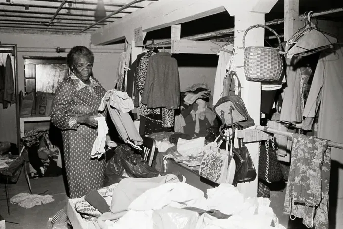 Framed Print : Woman Sorting Clothes for Homeless Framed Print : Woman Sorting Clothes for Homeless