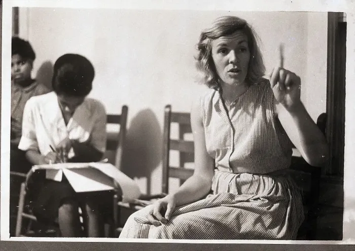 Framed Print : Woman Speaking with Finger Raised Framed Print : Woman Speaking with Finger Raised