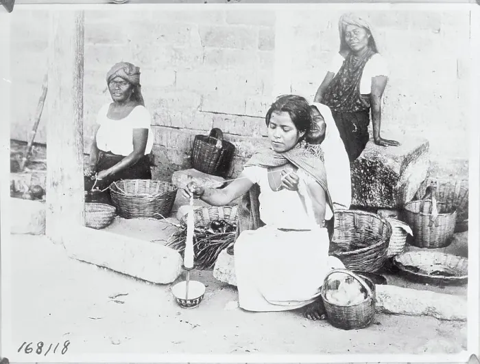Framed Print : Woman Spinning Cloth