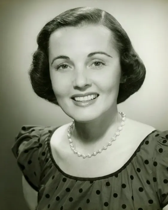 Framed Print : Woman in spotted dress posing in studio, (B&W), (Close-up), (Portrait) Framed Print : Woman in spotted dress posing in studio, (B&W), (Close-up), (Portrait)
