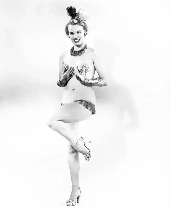 Framed Print : Woman in stage costume posing in studio (B&W) Framed Print : Woman in stage costume posing in studio (B&W)